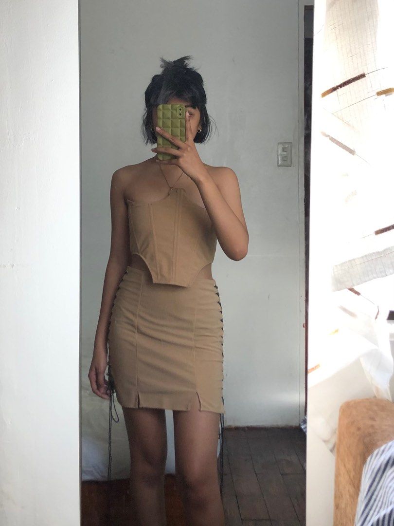 Beige Corset & Skirt Coords (Category: Sets or Coordinates) located in Manila. Submitted by sanesagi (Listing ID 1219269114, Image 1). Description: never worn. this is from threadandwear.ph on ig! perfect for smexy gurls who love to party!! skirt's fabric is quite thin. everything can be adjusted with the strings so can fit up to semi-med <33.