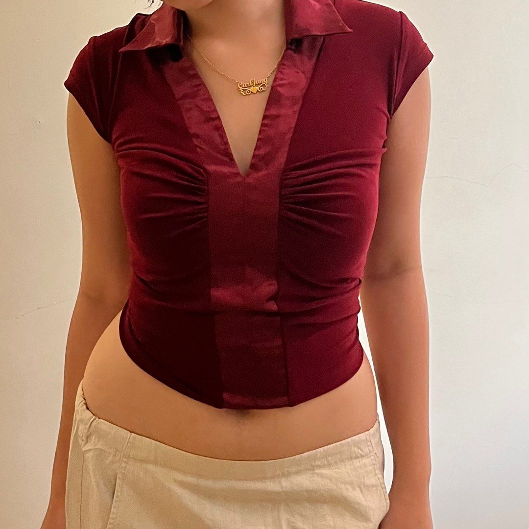 Flattering Red v-neck polo satin/spandex (Category: Blouses) located in Calamba. Submitted by fromynes (Listing ID 1219204905, Image 2). Description: 💌 @fromynes on ig xs-medium very flattering! as seen on photos comfortable to wear beautiful color thrifted, manage expectations shopee checkout available!.