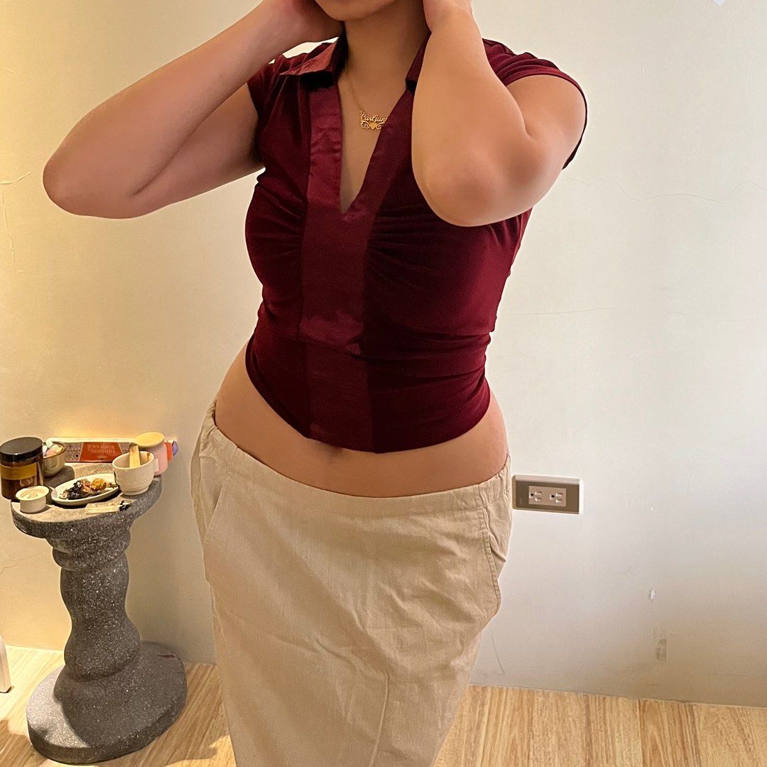 Flattering Red v-neck polo satin/spandex (Category: Blouses) located in Calamba. Submitted by fromynes (Listing ID 1219204905, Image 3). Description: 💌 @fromynes on ig xs-medium very flattering! as seen on photos comfortable to wear beautiful color thrifted, manage expectations shopee checkout available!.