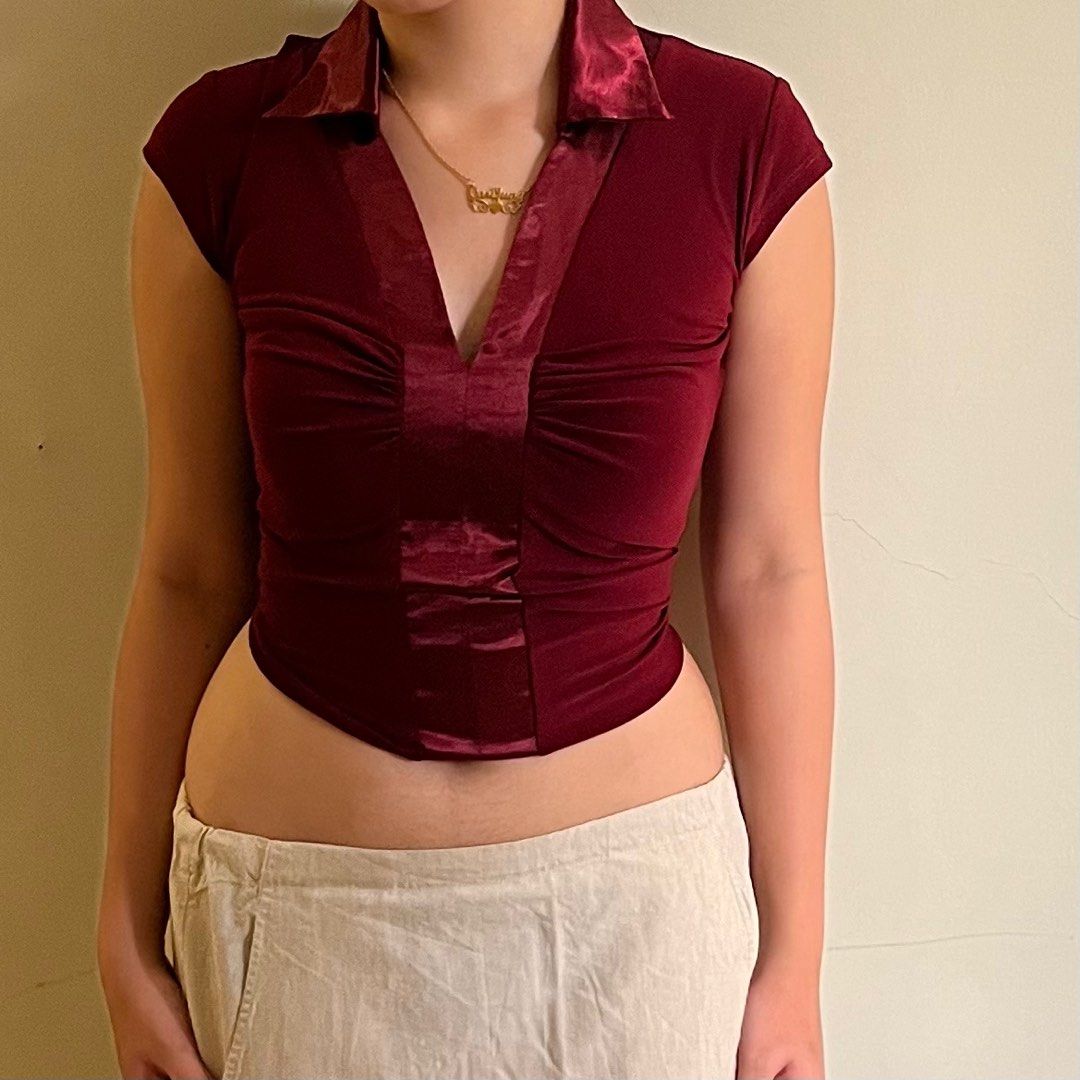 Flattering Red v-neck polo satin/spandex (Category: Blouses) located in Calamba. Submitted by fromynes (Listing ID 1219204905, Image 1). Description: 💌 @fromynes on ig xs-medium very flattering! as seen on photos comfortable to wear beautiful color thrifted, manage expectations shopee checkout available!.