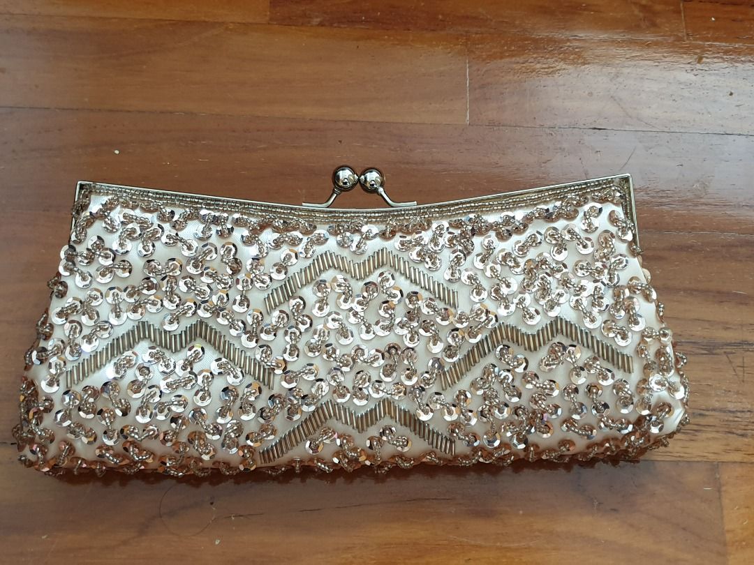 Champagne glitter clutch store bag
