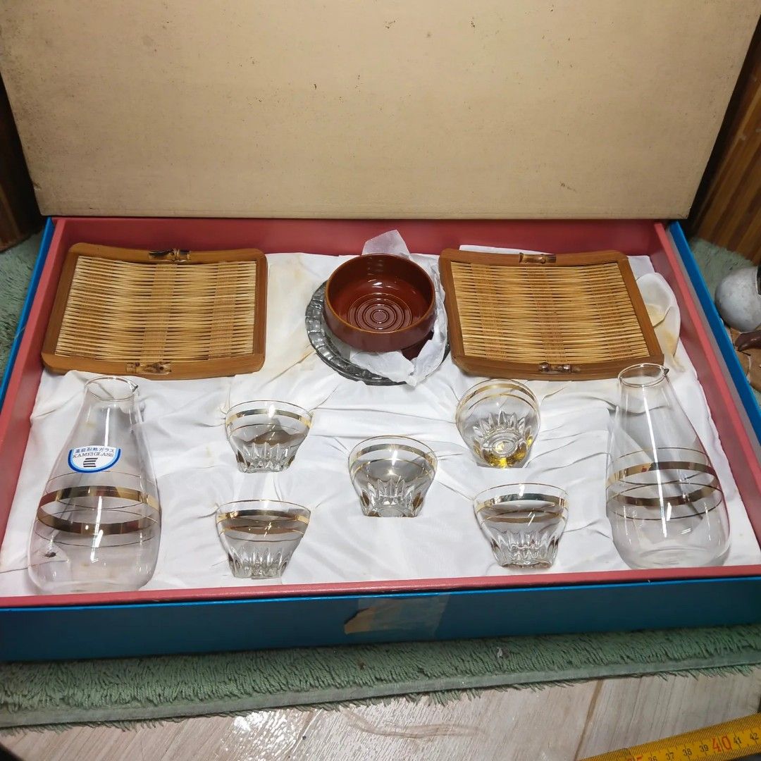 Kamei Glass Sake Set (Category: Other Kitchenware & Tableware) located in Malolos. Submitted by jestrelita (Listing ID 1219334298, Image 2). Description: Kamei Glass Sake Set P780 only - 2 clear sake jug and 5 clear shut glass with gold lines design - 2 mini bowls and coaster - 1 glass ashtray - unused with box - round wooden tray not included - good condition 🇯🇵🏯👘👺🗾🍱🎎🍜🍙.