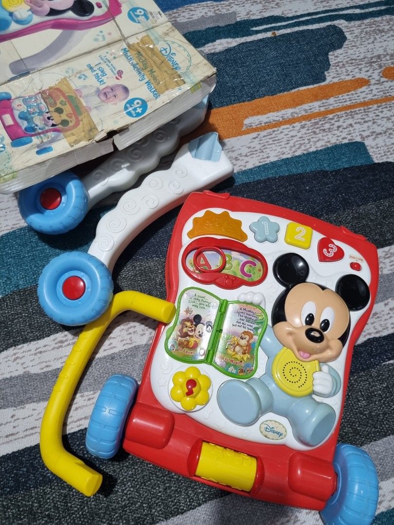 Mickey mouse bouncer and walker store