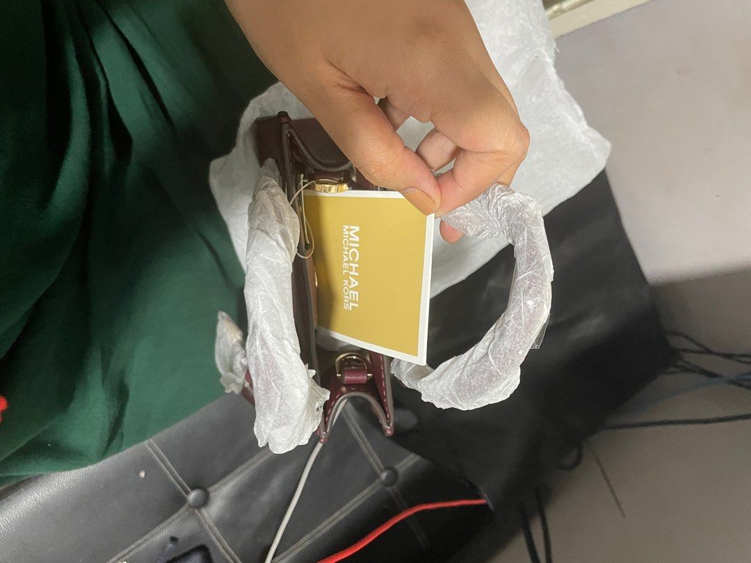 Mk Mercer XS (Category: Luxury Bags & Wallets) located in Marikina City. Submitted by jzzy_kt (Listing ID 1218907891, Image 3). Description: Original MK Mercer XS Merlot Will fit Iphone Pro/ Promax and small wallet With 3 cardslot inside For sale or swap to black color .