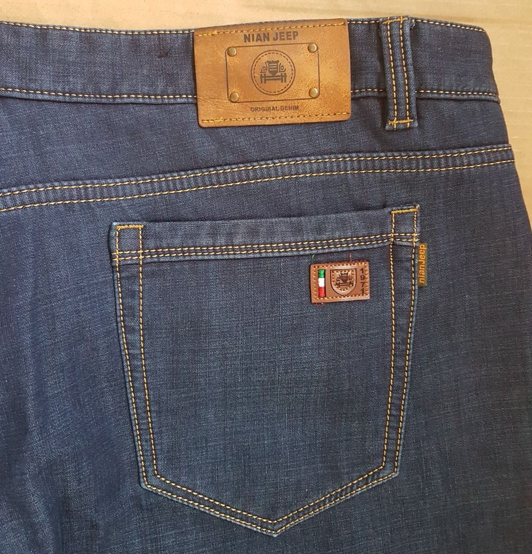 NIANJEEP Fashion Jeep Designer Denim Jeans Dark Denim Nian Jeep Plus Size W42 Original Apparels High Elasticity Street Fashion Baggy Style