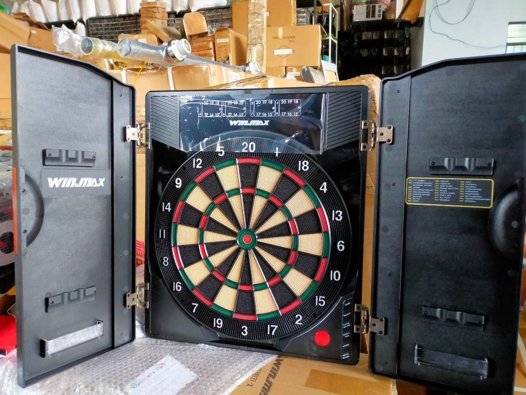 WIN MAX ELECTRONIC DART BOARD WITH CABINET (Category: Other Sports Equipment and Supplies) located in San Pablo. Submitted by abreyesjezreen (Listing ID 1219206698, Image 2). Description: Php 11,800 - You just set the game and it automatically tracks the scoring, which you enter manually, according to the game you're playing. This means that you can play 301 or 901 and not have to do any math. The board will automatically register segments, calcu
