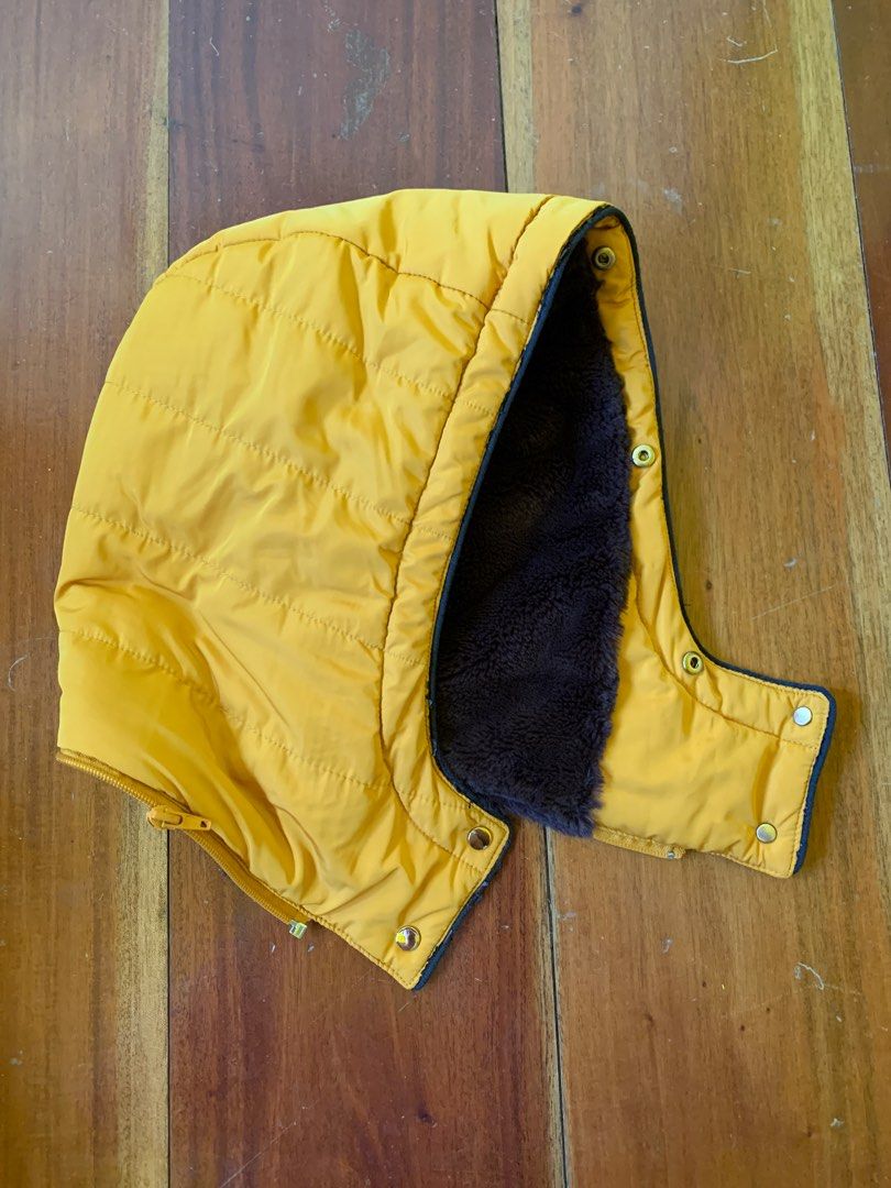 ZARA Women's Puffer Jacket (Category: Coats, Jackets and Outerwear) located in Marikina City. Submitted by raiafr (Listing ID 1219213580, Image 3). Description: Women's puffer jacket from Zara. I remember original price is at P4,000+. Mango yellow color. Size M. Detachable hood. Very soft, fake fur lining inside. Please check ALL photos for defects, nag-crack and disintegrate na yung fake leather along the zippers. Very warm and comfy, I use it e