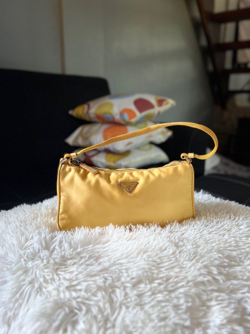 Authentic Prada Pochette Bag (Category: Luxury Bags & Wallets) located in Binalonan. Submitted by sheenaluxarchive (Listing ID 1219389468, Image 1). Description: Can’t go wrong with this Yellow Prada Pochette😍 Rank A Authentic .