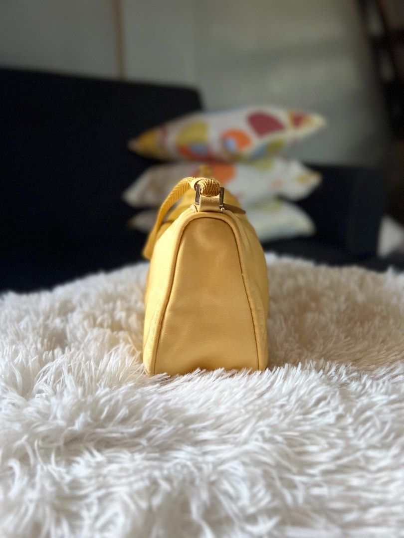 Authentic Prada Pochette Bag (Category: Luxury Bags & Wallets) located in Binalonan. Submitted by sheenaluxarchive (Listing ID 1219389468, Image 2). Description: Can’t go wrong with this Yellow Prada Pochette😍 Rank A Authentic .