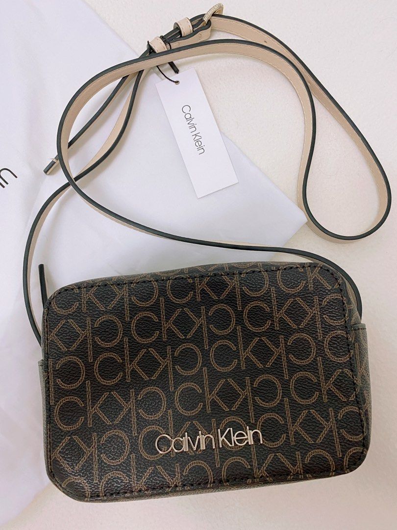 Calvin Klein All-Over Monogram Women Bag Camera Bag Crossbody Bag (100%  Authentic), Women's Fashion, Bags & Wallets, Cross-body Bags on Carousell