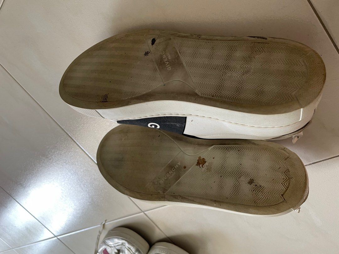 Givenchy (Category: Sneakers & Footwear) located in Singapore. Submitted by acarrousell88 (Listing ID 1219449686, Image 3). Description: Leather upper with rubber sole Elastic strap accent Retails at 890 sgd Need to clean the front and side after that looks nice already.
