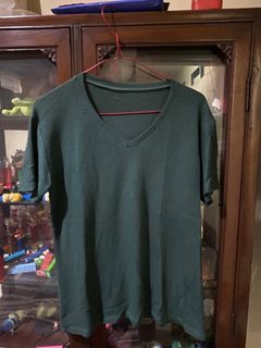 green knit top
