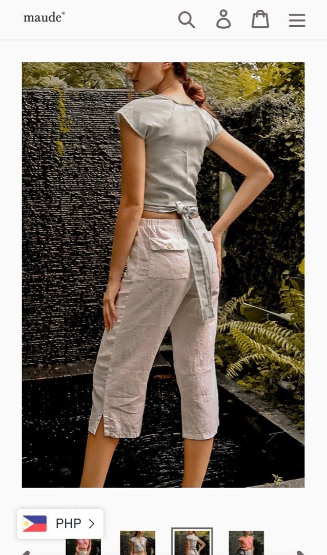 Maude st cassandra linen wrap top (Category: Blouses) located in Paranaque City. Submitted by obeawan (Listing ID 1219458828, Image 2). Description: From a local shop! Our own twist to the classic wrap-around top. The sleeves are not basic and is made to make the shoulders look slimmer. You can control the over-all fit and how much skin you want to show with the wrap top style. FEATURES Cropped fit V-neckline Covered back Wrap-around style No zip