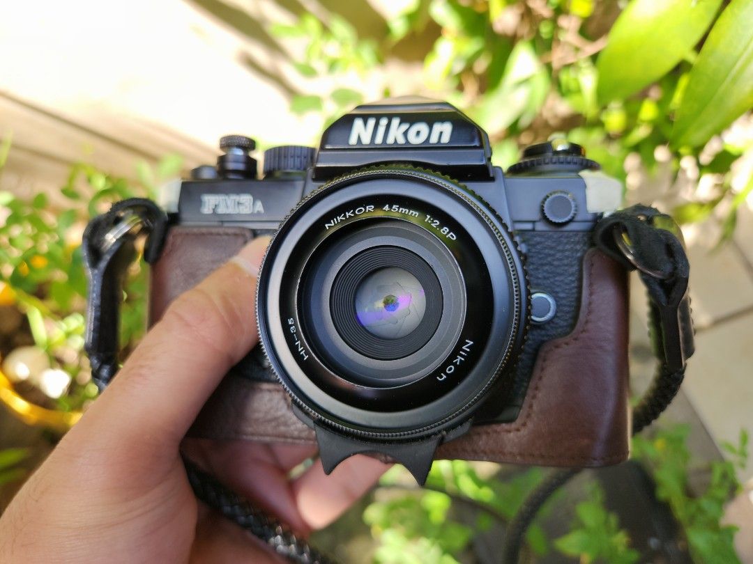 Nikon 45mm 2.8 ais-p rare black (Category: Lens & Kits) located in Quezon City. Submitted by eramo024 (Listing ID 1219364201, Image 3). Description: - Mint condition - Selling only the lens and camera is not included. - No issue with glass - lens cap, lens hood and rear cap included. - This is Nikon's smallest lens. Best for street photographyl. Lens itself is almost the size of a lens rear cap, but takes sharp photos. Some of my favourite shots 