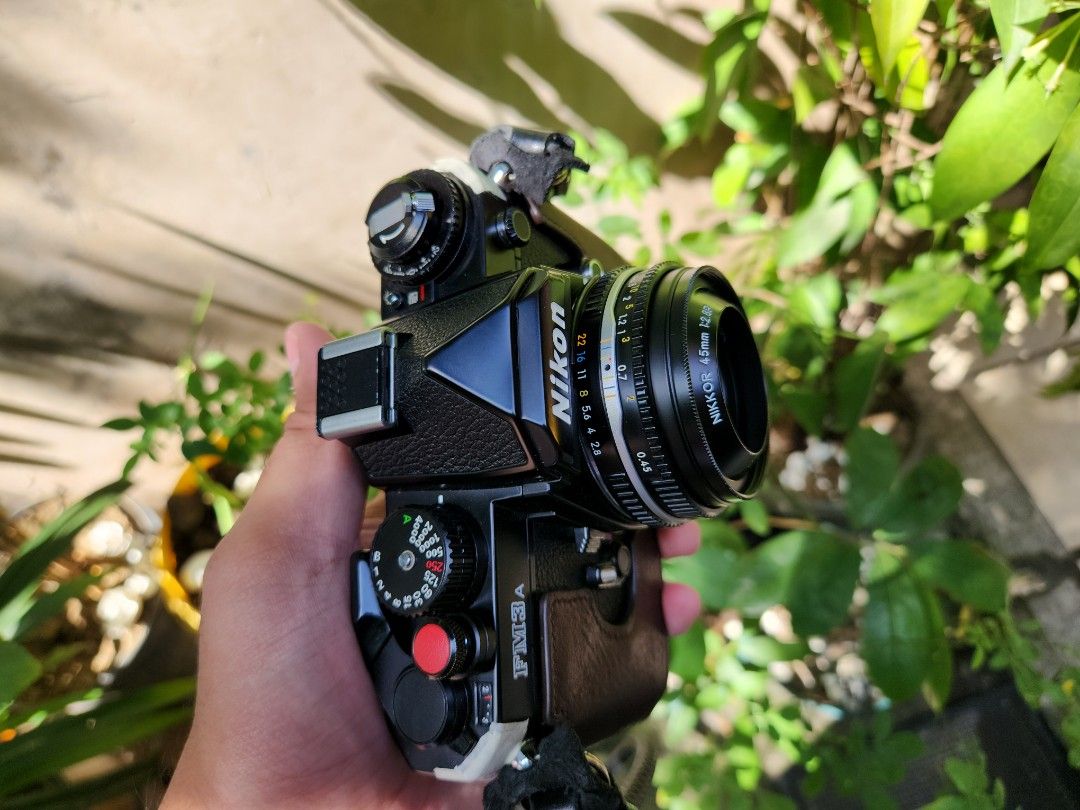 Nikon 45mm 2.8 ais-p rare black (Category: Lens & Kits) located in Quezon City. Submitted by eramo024 (Listing ID 1219364201, Image 2). Description: - Mint condition - Selling only the lens and camera is not included. - No issue with glass - lens cap, lens hood and rear cap included. - This is Nikon's smallest lens. Best for street photographyl. Lens itself is almost the size of a lens rear cap, but takes sharp photos. Some of my favourite shots 