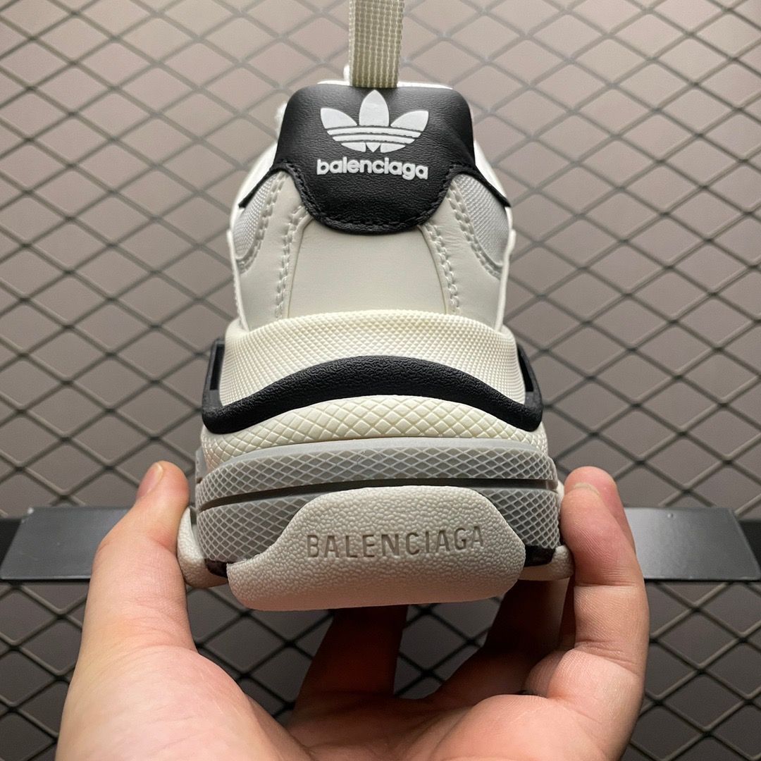 Triple s on sale black and white