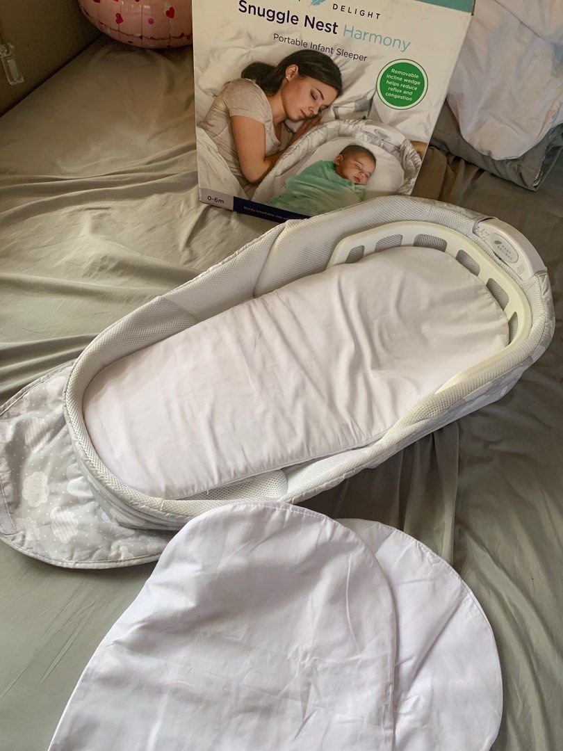 Snuggle nest harmony portable infant sleeper deals