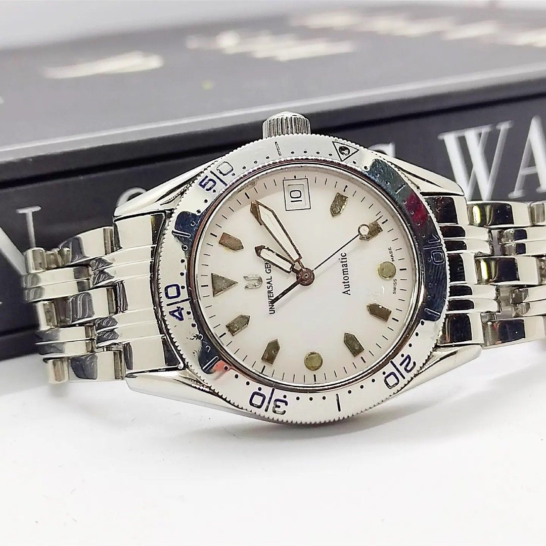Universal Geneve (Category: Luxury Watches) located in Manila. Submitted by ab.authentic.collection (Listing ID 1219499948, Image 1). Description: Available for Sale Universal Geneve - Ref. 871.175 - 35mm in diameter - Dial lume show signs of aging - Approx. 7 inches wrist - Automatic; Keeps good time - With free travel leather pouch included - Unit only Open for Meetups (Sure buyer) Note: manage expectations on vintage and pre-owned watches. The