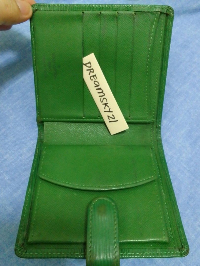 Used Louis Vuitton Wallet Epi Leather LV (Category: Luxury Bags & Wallets) located in Cavite. Submitted by dreamsky21 (Listing ID 1219466889, Image 3). Description: There's some minor cracks on the leather shown in photos. Ung black parts there's some peeling but no stickyness. Japan bought. Green color is a little muted than in the photos..