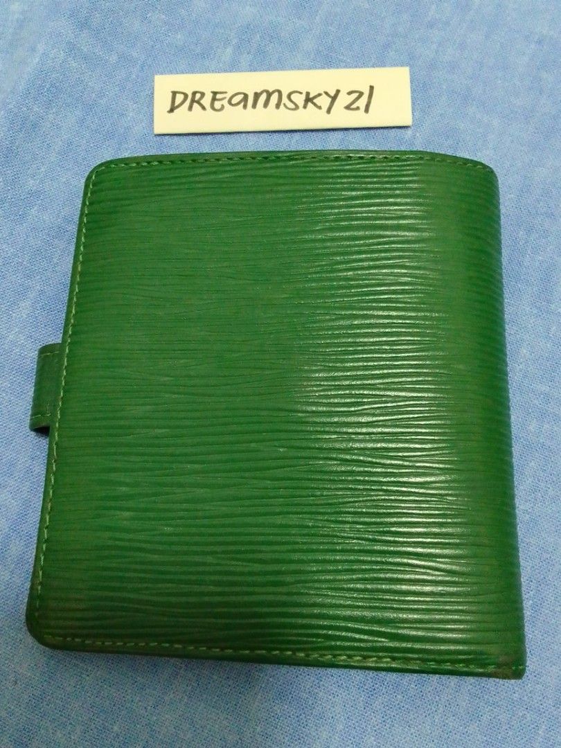 Used Louis Vuitton Wallet Epi Leather LV (Category: Luxury Bags & Wallets) located in Cavite. Submitted by dreamsky21 (Listing ID 1219466889, Image 2). Description: There's some minor cracks on the leather shown in photos. Ung black parts there's some peeling but no stickyness. Japan bought. Green color is a little muted than in the photos..