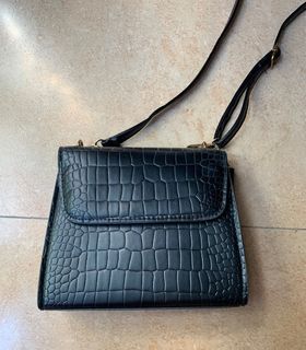 Black crocodile pattern sling bag