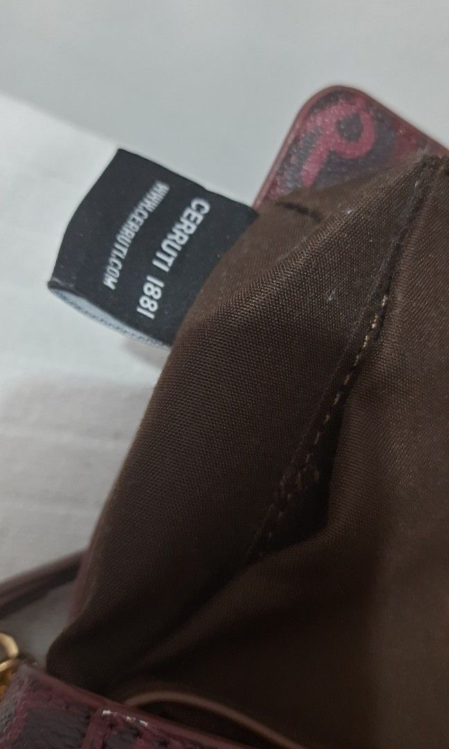 Cerruti 2 way bag (Category: Luxury Bags & Wallets) located in Marikina City. Submitted by laila15 (Listing ID 1219609438, Image 3). Description: Cerruti 2 way bag Adjustable strap rub on the corner of the bag.