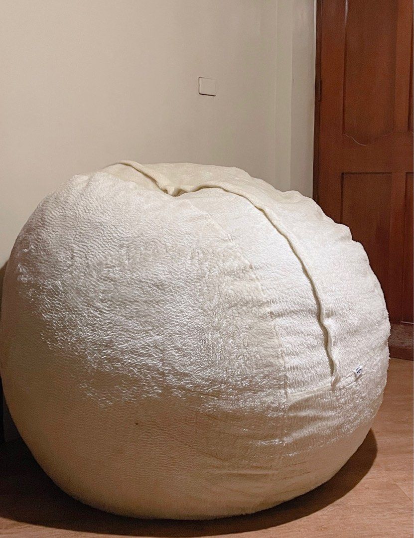 Giant beanbag sofa (Category: Sofas) located in Silang. Submitted by girlyouneedthis (Listing ID 1219660468, Image 3). Description: Original price 45k, now for only 28k, with lining, inclusions are 1 cream furr cover, 1 cream suede cover, and 1 black velvet cover. This is super steal! And super huge! Just needs some dry cleaning. .