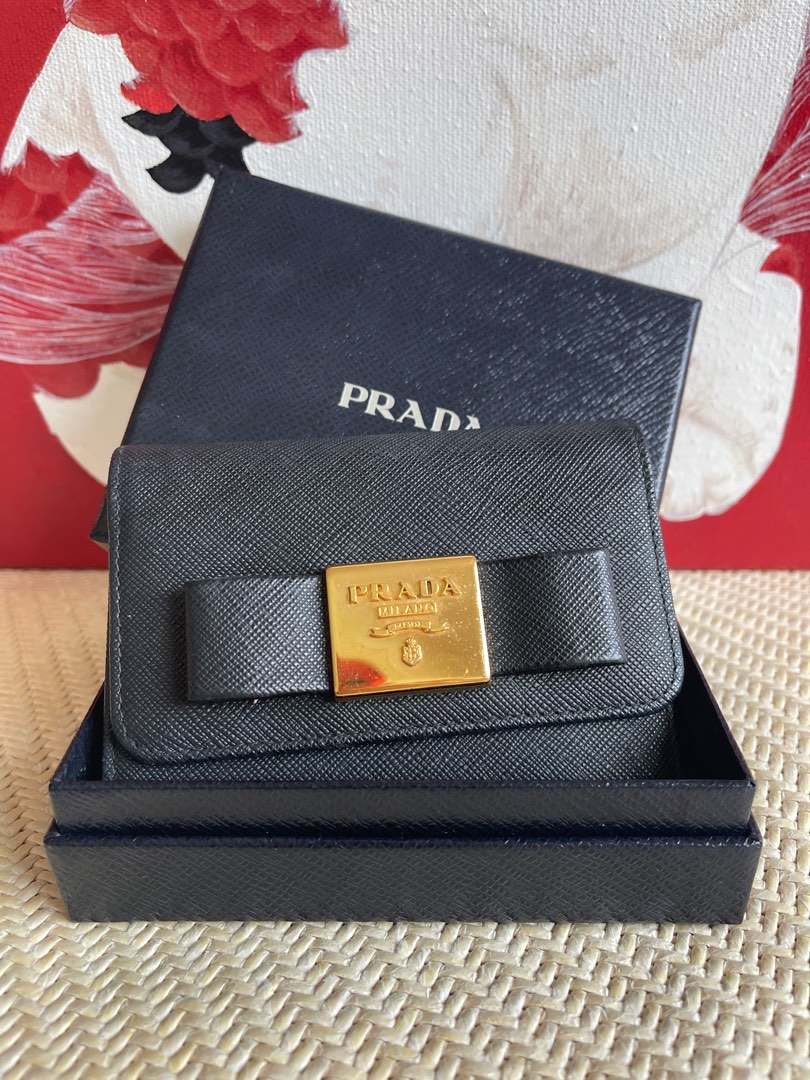Prada wallet with authentication card, Women's Fashion, Bags & Wallets