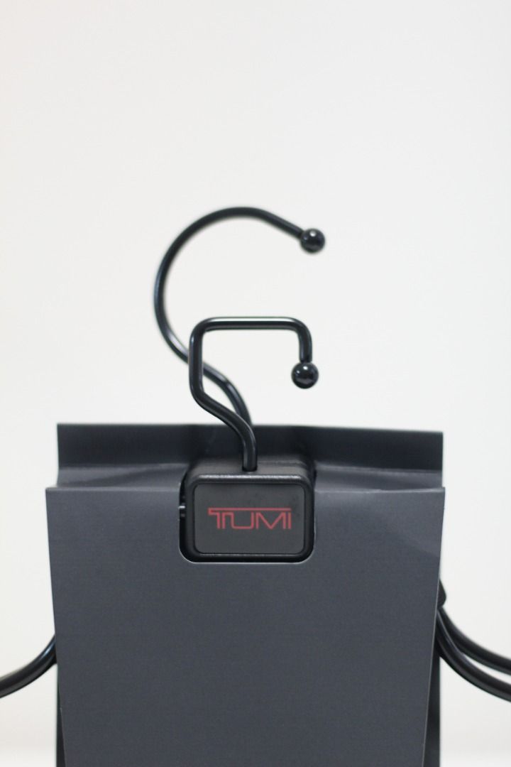 Tumi hangers top
