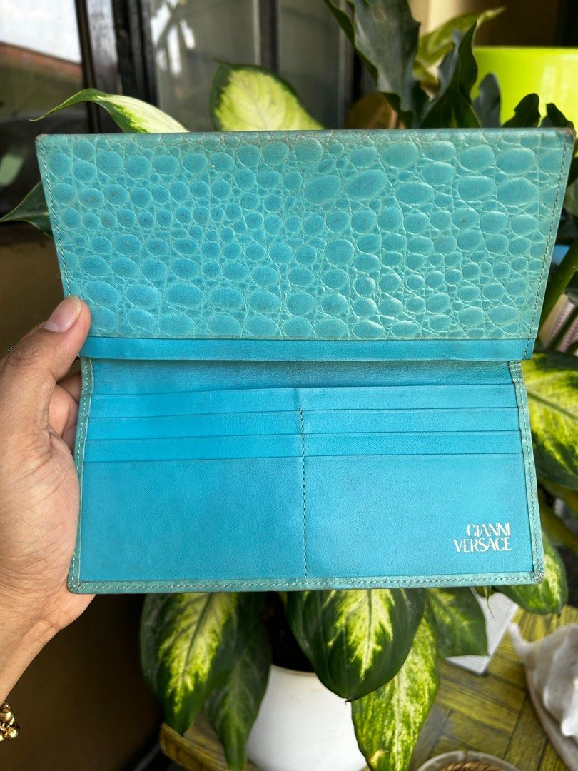 VERSACE long Wallet (Category: Luxury Bags & Wallets) located in Quezon City. Submitted by WIMC2ndaccount (Listing ID 1219564598, Image 2). Description: VERSACE Long Wallet ☑️item in Japan ☑️ORIGINAL ☑️Branded ☑️GOOD condition ☑️ GENUINE LEATHER! ☑️Vintage ☑️managE your expectation this is second hand / Vintage Item Hindi Brand New Binibili mo! 🔴Gandan ng Color nito , good condition. Kindly check the photos, ibang part is watermarks , rubs corne
