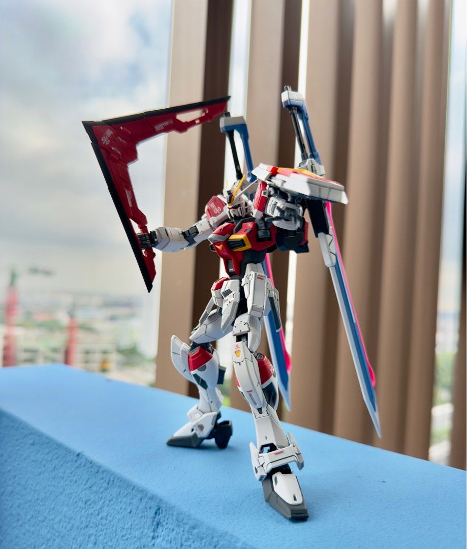 Built Bandai RG 1/144 Sword Impulse Gundam (Category: Toys & Collectibles) located in Singapore. Submitted by mezzybox (Listing ID 1223955963, Image 3). Description: Built. Panel line & matt coat & decal applied. It is a P bandai kit .