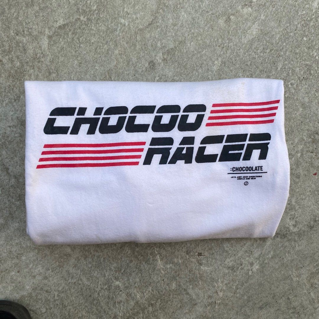 Chocoo Racer Basic White Graphic Shirt (Category: Tshirts & Polo Shirts ) located in Taytay. Submitted by cool.cat8 (Listing ID 1224118092, Image 2). Description: CHOCOOLATE GRAPHIC TEE ✷ SHOULER WIDTH: 21" ✷ PIT-TO-PIT WIDTH: 19.5" ✷ LENGTH: 26.5" MOP: GCASH/MAYA/BANK TRANSFER MOD: SHOPEE CHECKOUT/J&T EXPRESS .