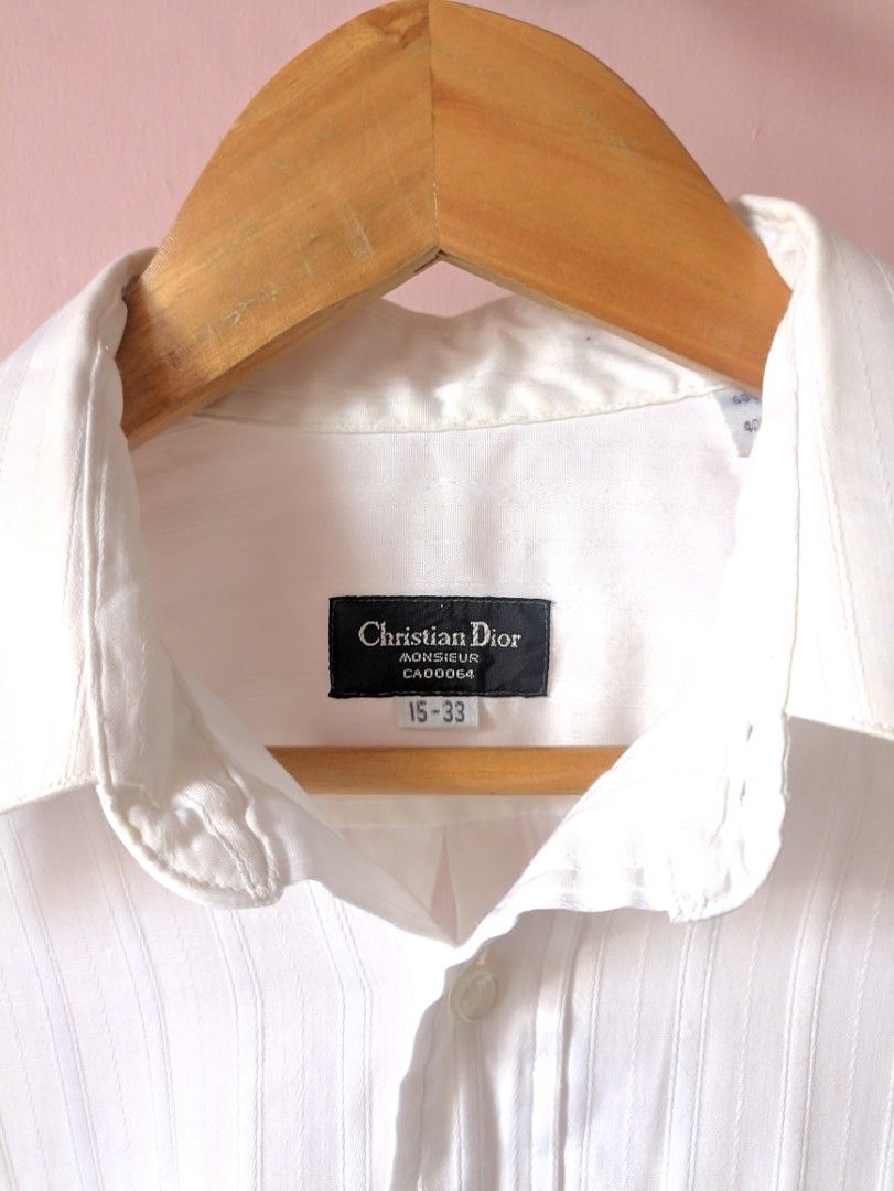 Christian Dior white polo (Category: Tshirts & Polo Shirts ) located in Taguig. Submitted by dropthatstuffph (Listing ID 1224035188, Image 3). Description: Size: no tag but fits M-L.
