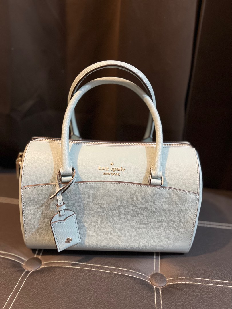 Kate spade devyn duffle bag (powder blue) on Carousell