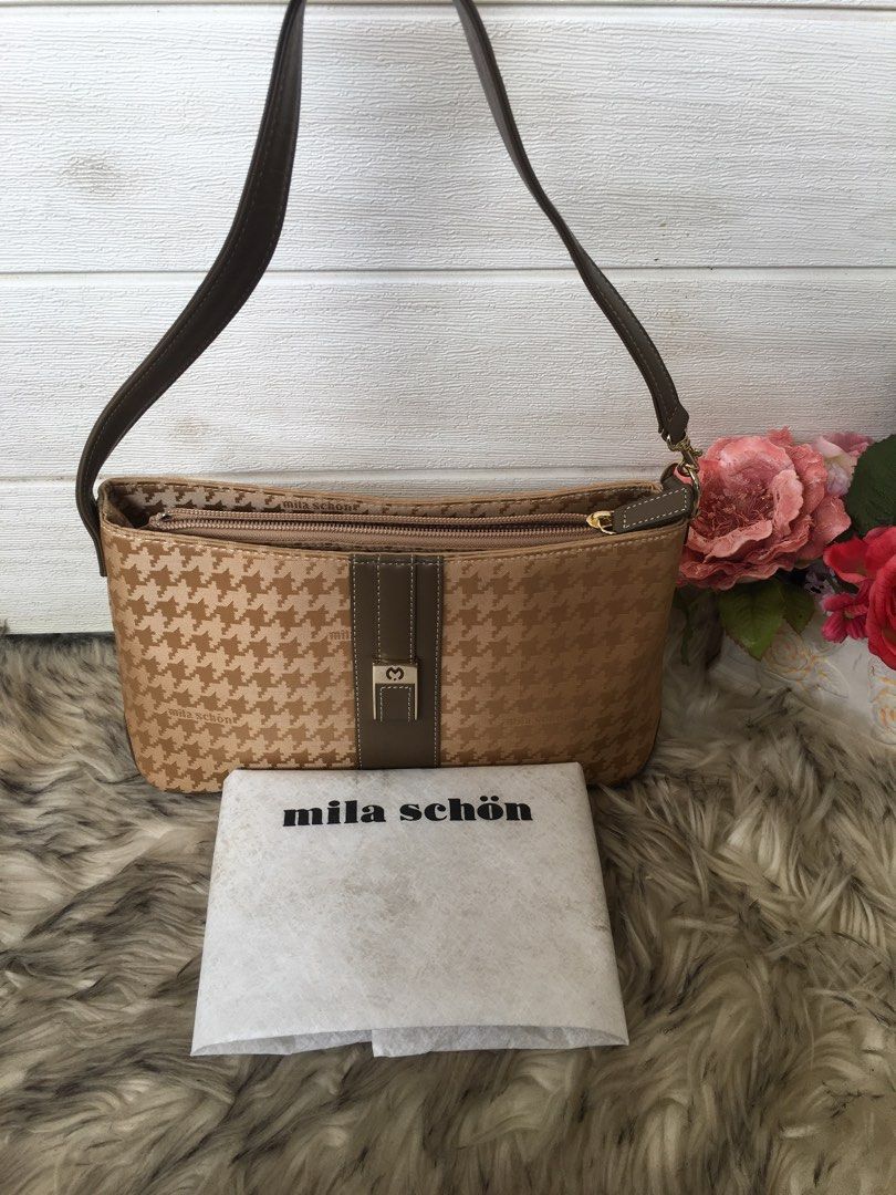 MILA SCHON shoulder bag (Category: Luxury Bags & Wallets) located in Tagum. Submitted by ynez.luxurypicksph (Listing ID 1223984020, Image 1). Description: Preloved Japan Adjustable strap Shoulder bag/handbag Small.