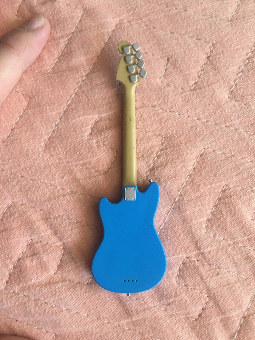 Mini electric guitar on Carousell