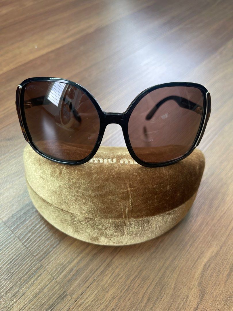 Miu miu best sale oversized sunglasses