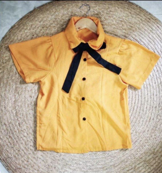 Mustard Yellow Top with Black Ribbon (Category: Blouses) located in Manila. Submitted by jasofficial (Listing ID 1224019058, Image 1). Description: Mustard Yellow Top with Black Ribbon Fits Small-Medium.