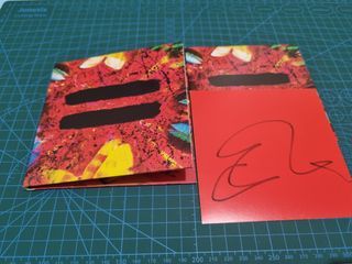 Pre-loved Ed Sheeran Equals with signed art card