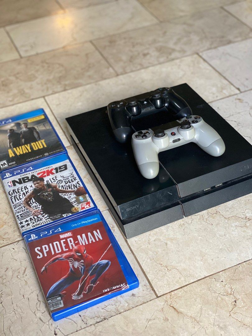 Ps4 phat 1TB (Category: PlayStation) located in Makati City. Submitted by theriftmnl (Listing ID 1224085823, Image 3). Description: PS4 phat 1TB w/ NBA 2k19, A Way Out, Spider-man Comes with 2 controllers, power cable, HDMI, 1 charging cable for controller. No box. Updated to latest software. Issues: disc eject button on ps4 doesn't work. (You can eject disc in the home page with your controller) R2 in grey controller doesn't work. Easy fix. LAST