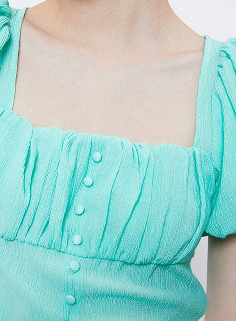 Ruched puff sleeve crop top (Category: Blouses) located in Davao. Submitted by closetbyjj (Listing ID 1224050059, Image 3). Description: Small Aqua green Slip on.