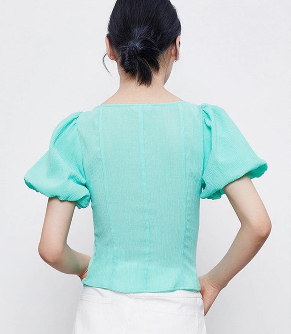 Ruched puff sleeve crop top (Category: Blouses) located in Davao. Submitted by closetbyjj (Listing ID 1224050059, Image 2). Description: Small Aqua green Slip on.