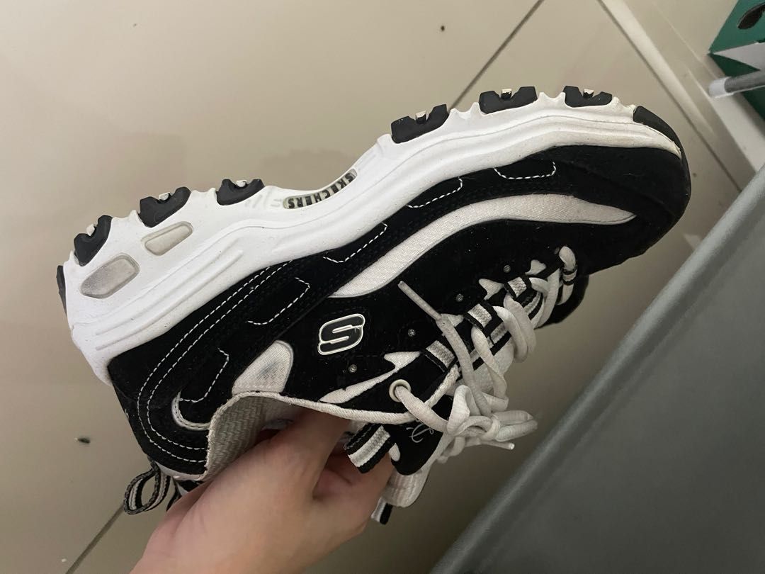 Black skechers portraits sales