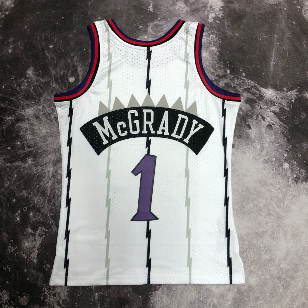 Tracy McGrady nba basketball toronto Raptors swingman Mitchell and ness  jersey, Men's Fashion, Activewear on Carousell