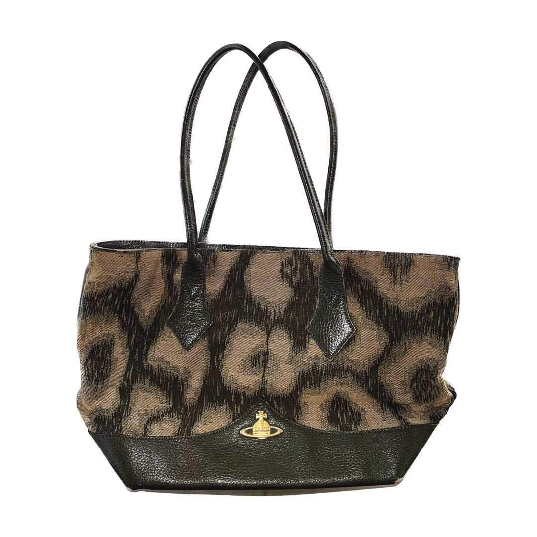 Vivienne Westwood Leopard Print Handbag (Category: Luxury Bags & Wallets) located in Calamba. Submitted by fromynes (Listing ID 1223965992, Image 1). Description: 💌 @fromynes on ig needs cleaning NGA hence the price has flaws, but manageable shopee checkout available 🤍.