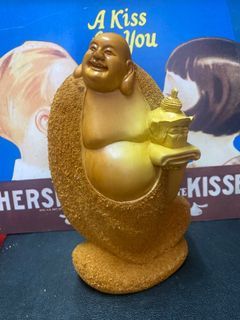 Wood carving laughing Buddha