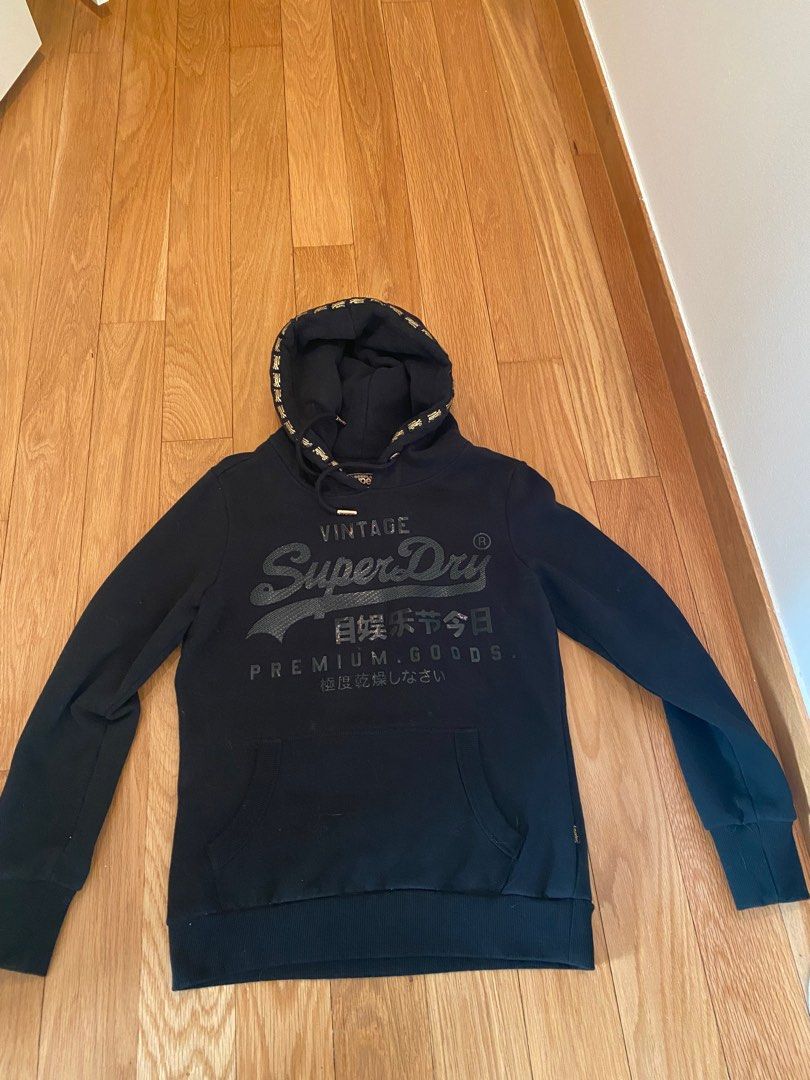 Black superdry hoodie with gold detailing Women s Fashion Coats Jackets and Outerwear on Carousell
