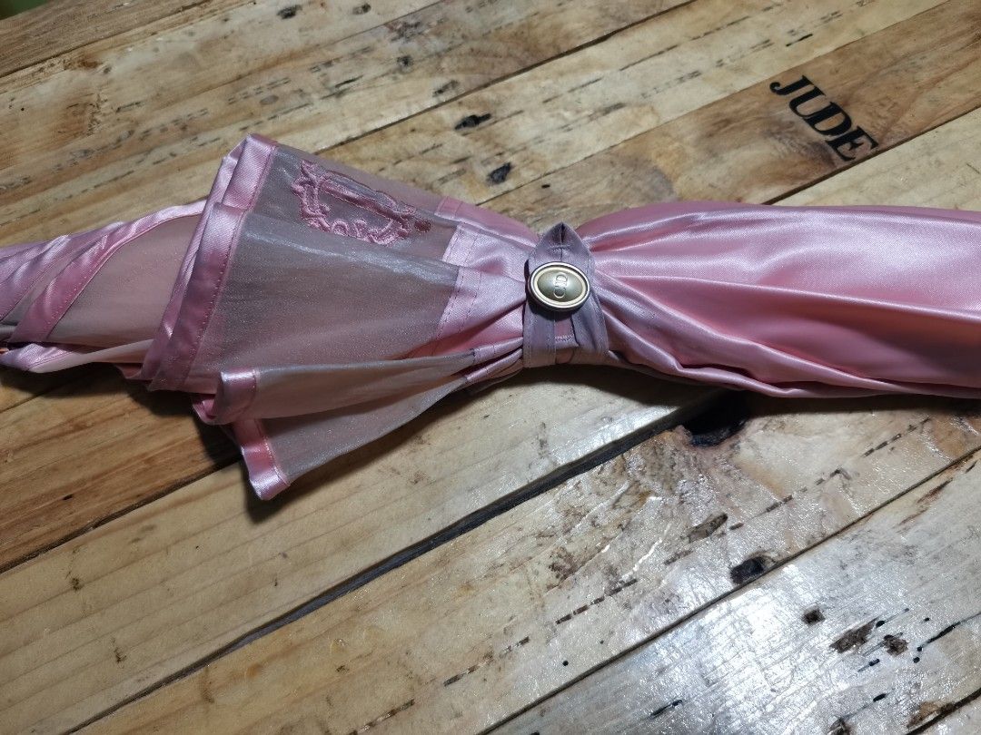CHRISTIAN DIOR UMBRELLA (Category: Umbrellas) located in Tanay. Submitted by judevalcorza (Listing ID 1225887935, Image 3). Description: CHRISTIAN DIOR UMBRELLA VERY GOOD USED CONDITION HAS SIGN OF USAGE SOME DIRT AND RUBS ISSUES POSTED ALREADY STILL PRESENTABLE AND WEARABLE 1000 PLUS SHIP VIA JNT.
