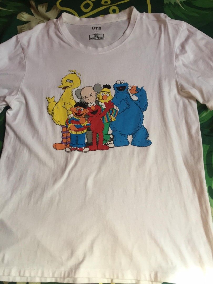 Kaws X uniqlo (Category: Tshirts & Polo Shirts ) located in Magalang. Submitted by _lemonade05 (Listing ID 1225791683, Image 1). Description: Kaws sesame street Size small Excellent condition Need wash 300+sf Loc: Pampanga.