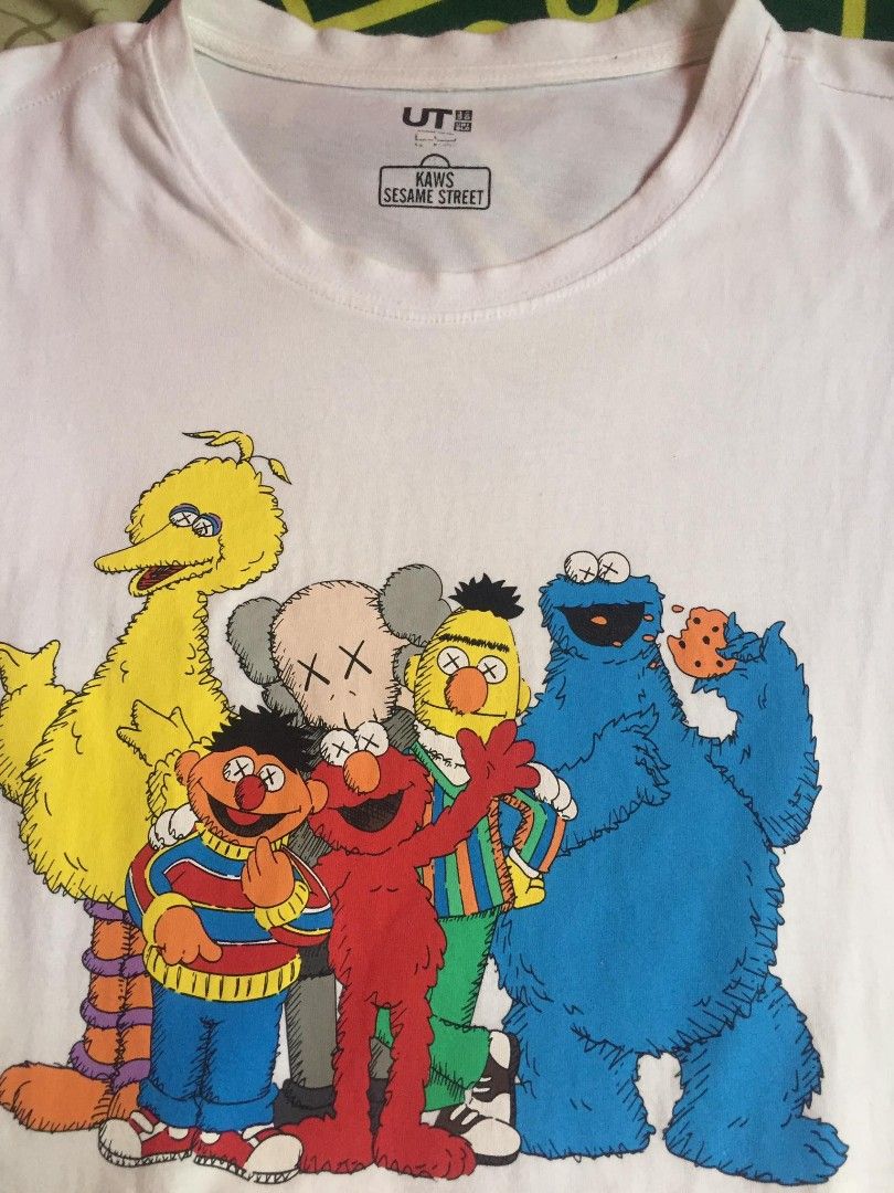 Kaws X uniqlo (Category: Tshirts & Polo Shirts ) located in Magalang. Submitted by _lemonade05 (Listing ID 1225791683, Image 2). Description: Kaws sesame street Size small Excellent condition Need wash 300+sf Loc: Pampanga.